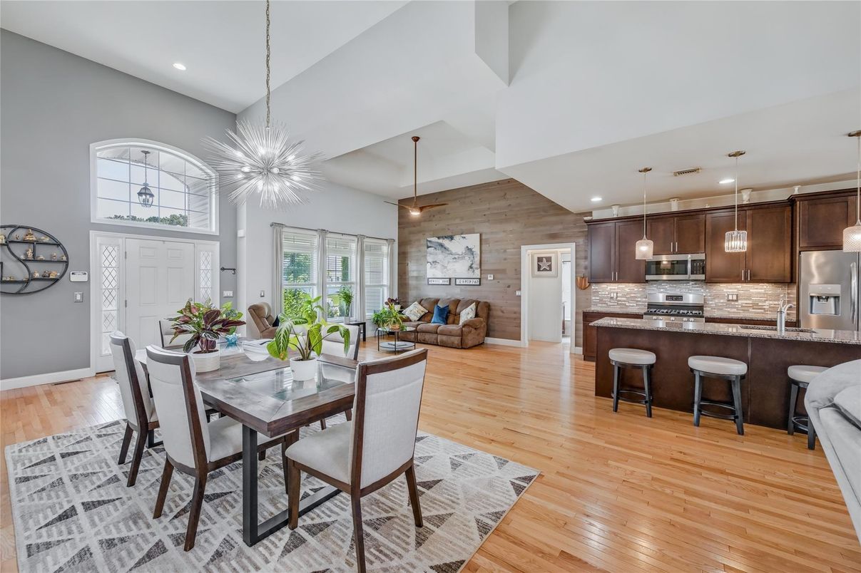 Dining room, Interior, Kitchen, Living room, Pendant Lights, Recessed Lighting, Stainless Steel Appliances, Wood Texture Flooring