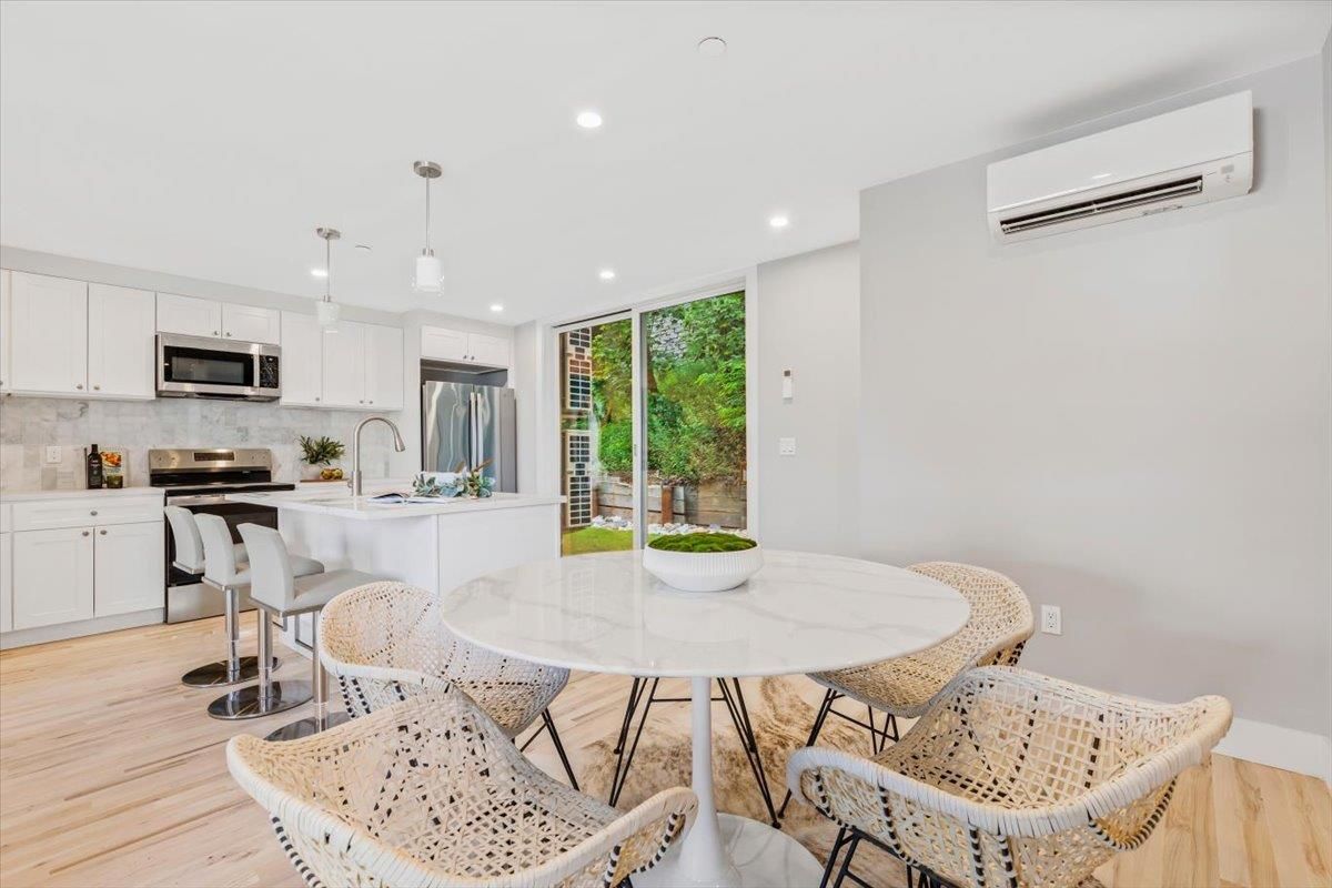 Dining room, Interior, Kitchen, Pendant Lights, Recessed Lighting, Stainless Steel Appliances, Wood Texture Flooring
