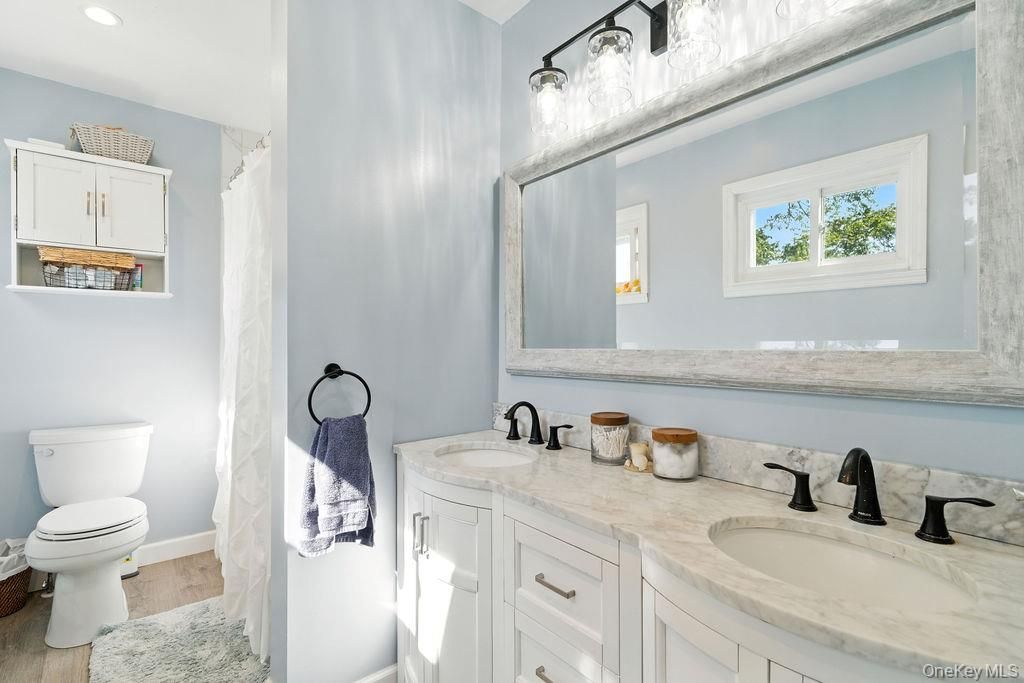Bathroom, Dual Sink Vanities, Interior, Recessed Lighting, Wood Texture Flooring