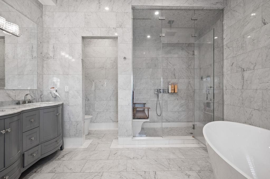 Bathroom, Free Standing Baths, Glass Shower, Interior, Marble, Marble Walls, Recessed Lighting
