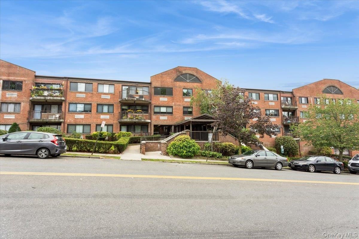 Exterior, Facade, Brick Facade, Condo Building