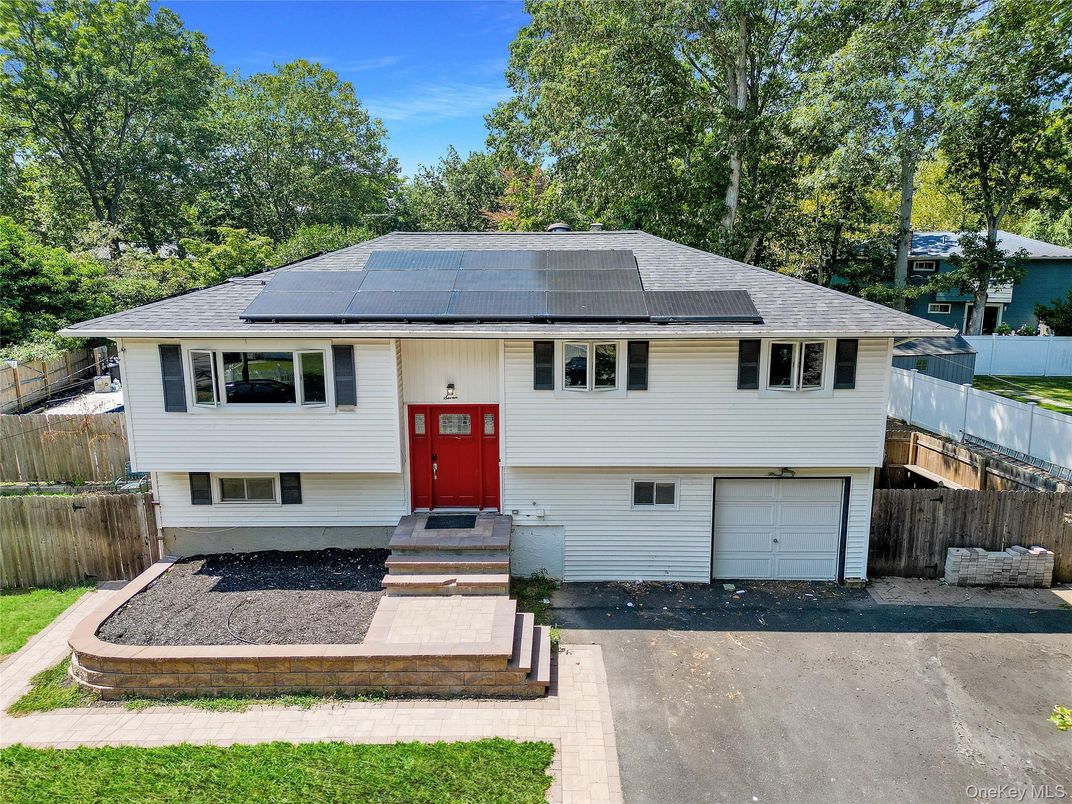 Attached, Exterior, Facade, Solar Panels, Raised Ranch