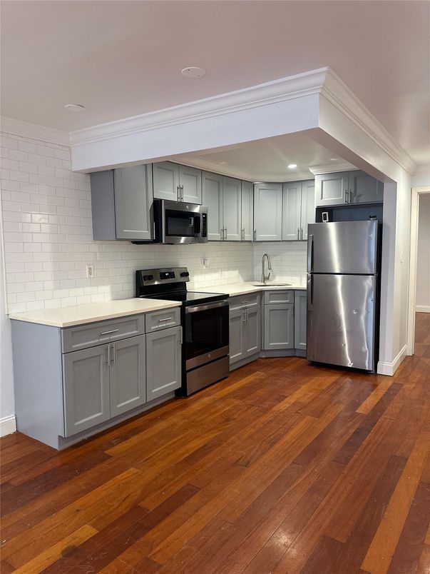 Interior, Kitchen, Recessed Lighting, Stainless Steel Appliances, Wood Texture Flooring