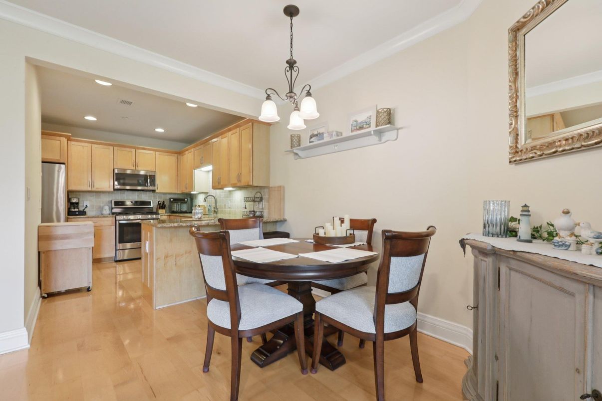 Dining room, Interior, Kitchen, Pendant Lights, Recessed Lighting, Stainless Steel Appliances, Wood Texture Flooring