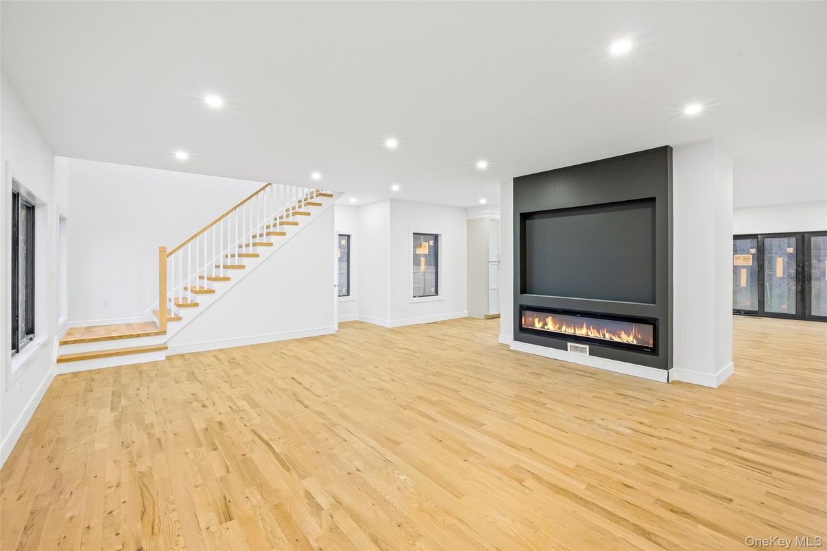 Empty room, Fireplace, Interior, Recessed Lighting, Wood Texture Flooring