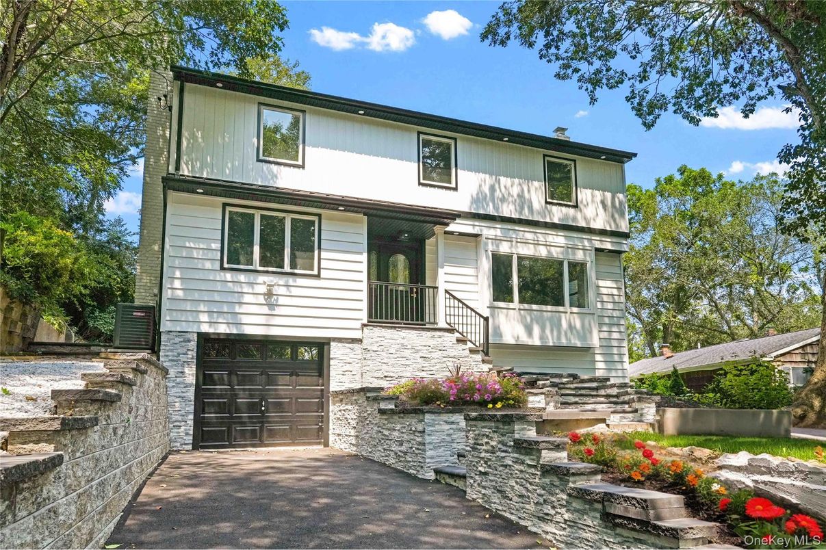 Attached, Exterior, Facade, Raised Ranch