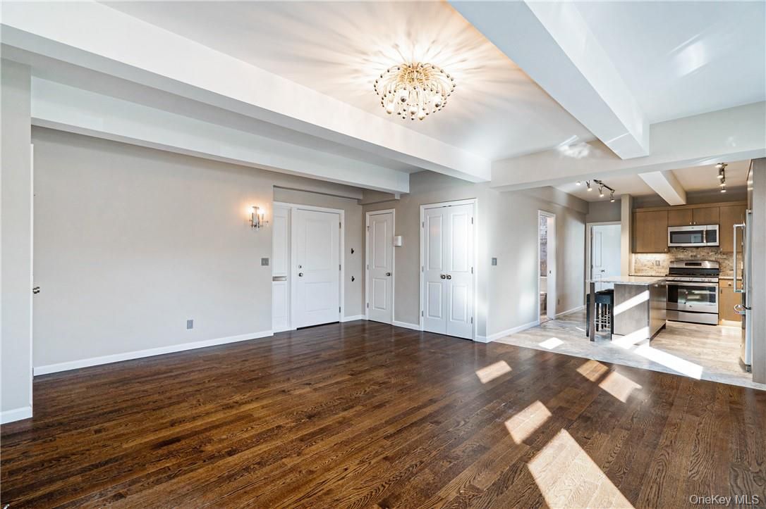 Chandelier, Empty room, Interior, Kitchen, Stainless Steel Appliances, Wood Texture Flooring