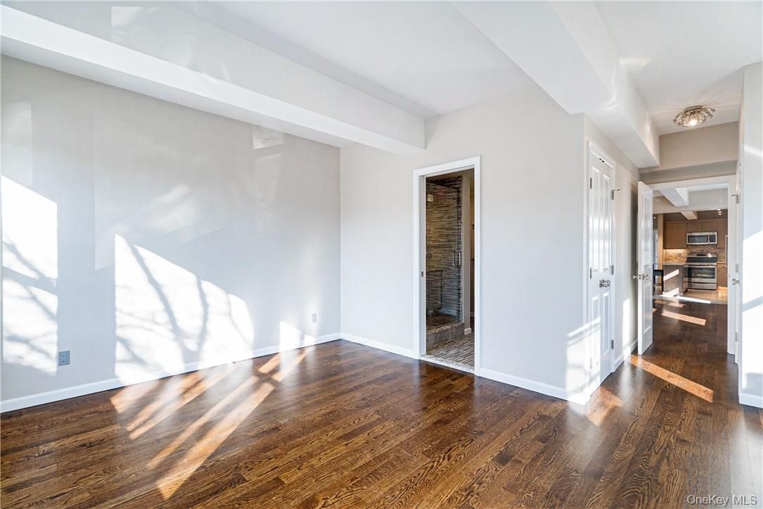 Empty room, Interior, Kitchen, Stainless Steel Appliances, Wood Texture Flooring