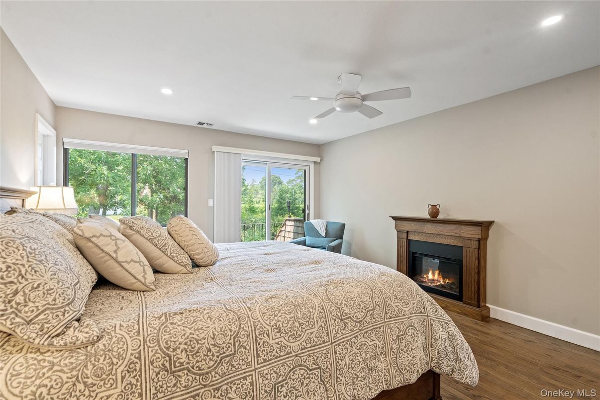 Bedroom, Fireplace, Interior, Recessed Lighting, Wood Texture Flooring