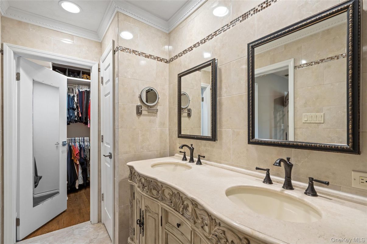 Bathroom, Dual Sink Vanities, Interior, Recessed Lighting, Walk-in Closets, Wood Texture Flooring