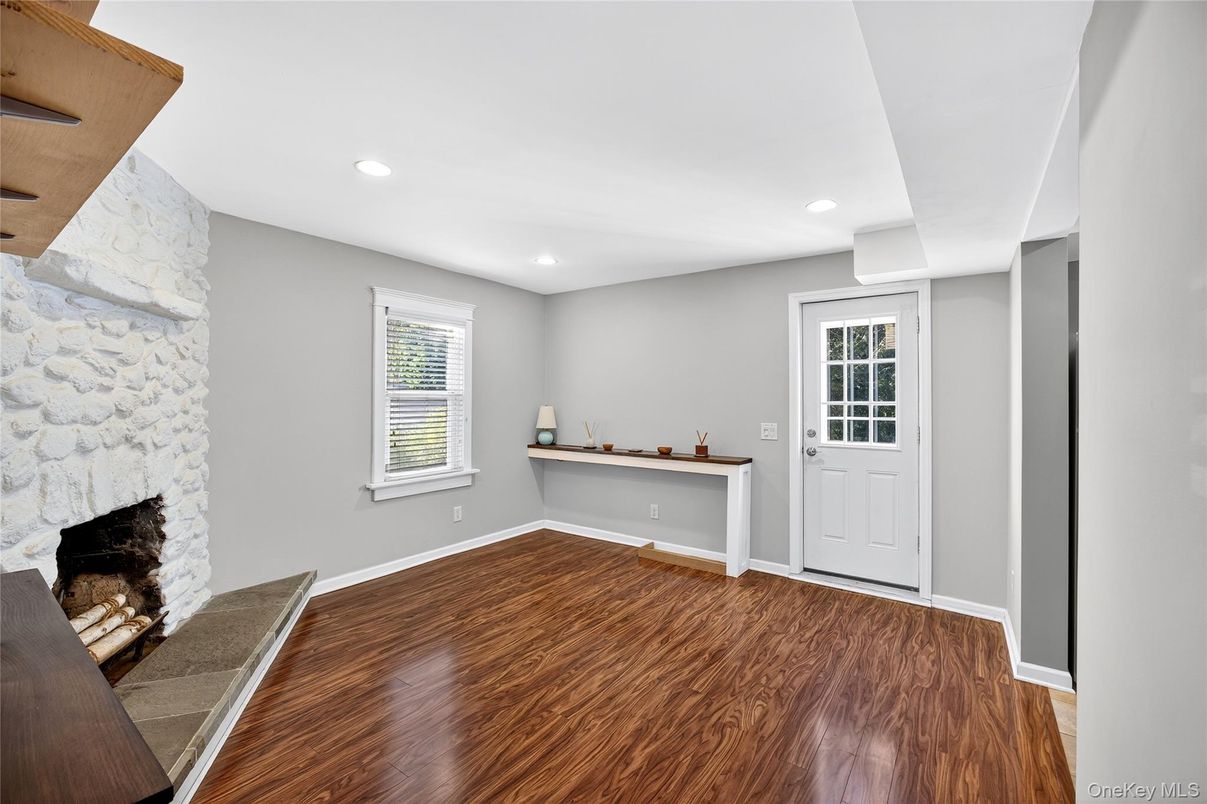 Empty room, Fireplace, Interior, Recessed Lighting, Wood Texture Flooring