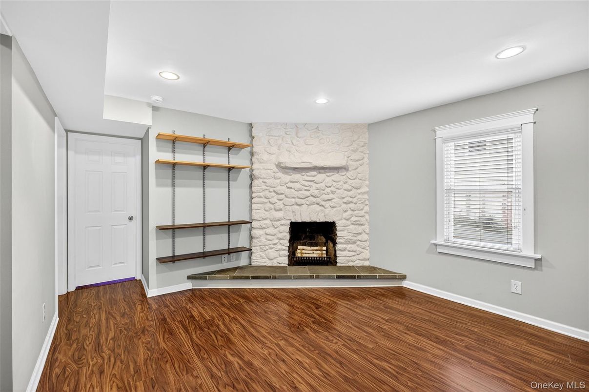 Fireplace, Interior, Recessed Lighting, Stone Walls, Wood Texture Flooring
