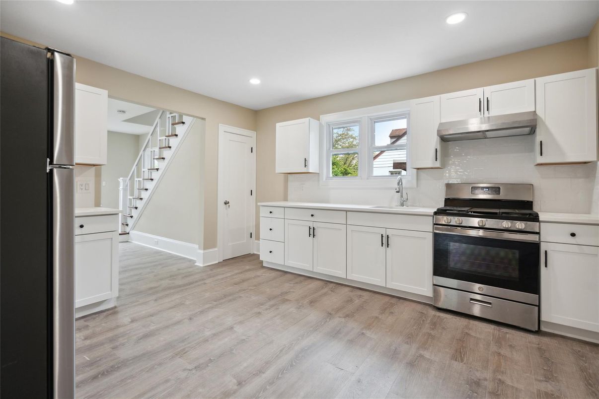 Interior, Kitchen, Recessed Lighting, Stainless Steel Appliances, Wood Texture Flooring