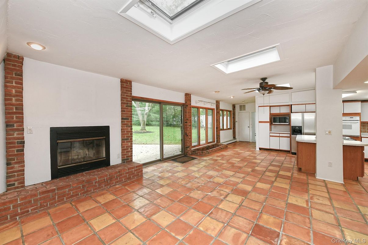 Empty room, Fireplace, Interior, Kitchen, Recessed Lighting, Stone Walls