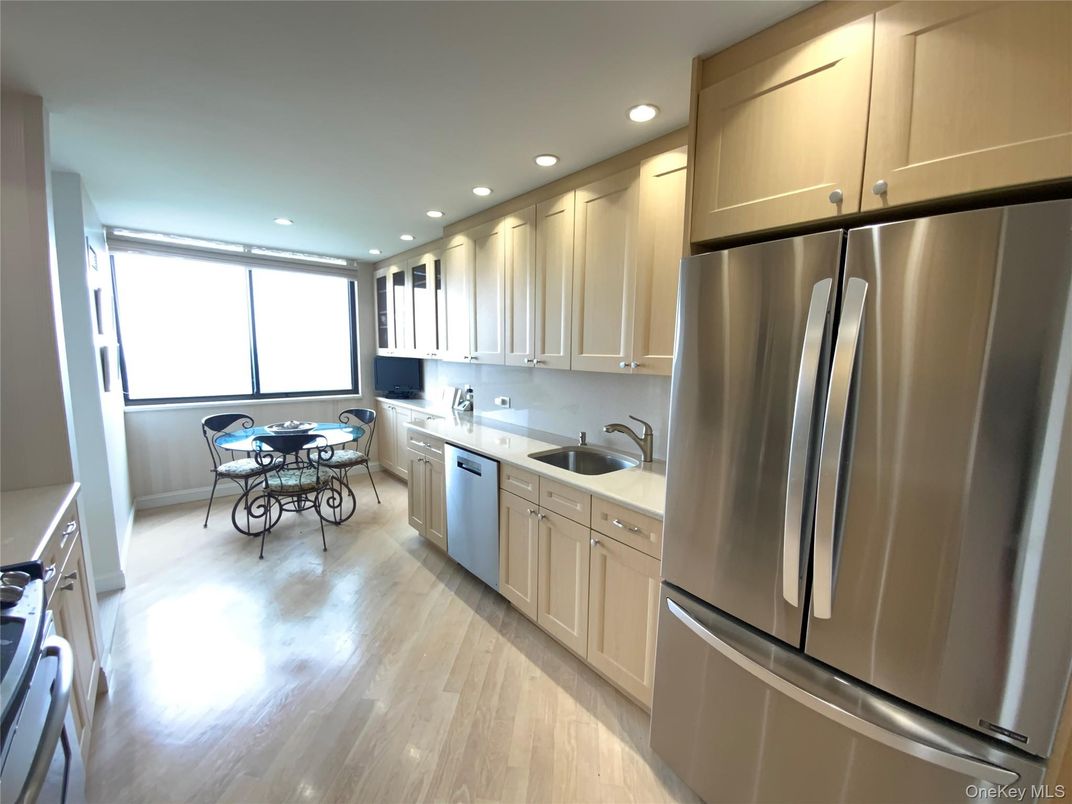 Dining room, Interior, Kitchen, Recessed Lighting, Stainless Steel Appliances, Wood Texture Flooring