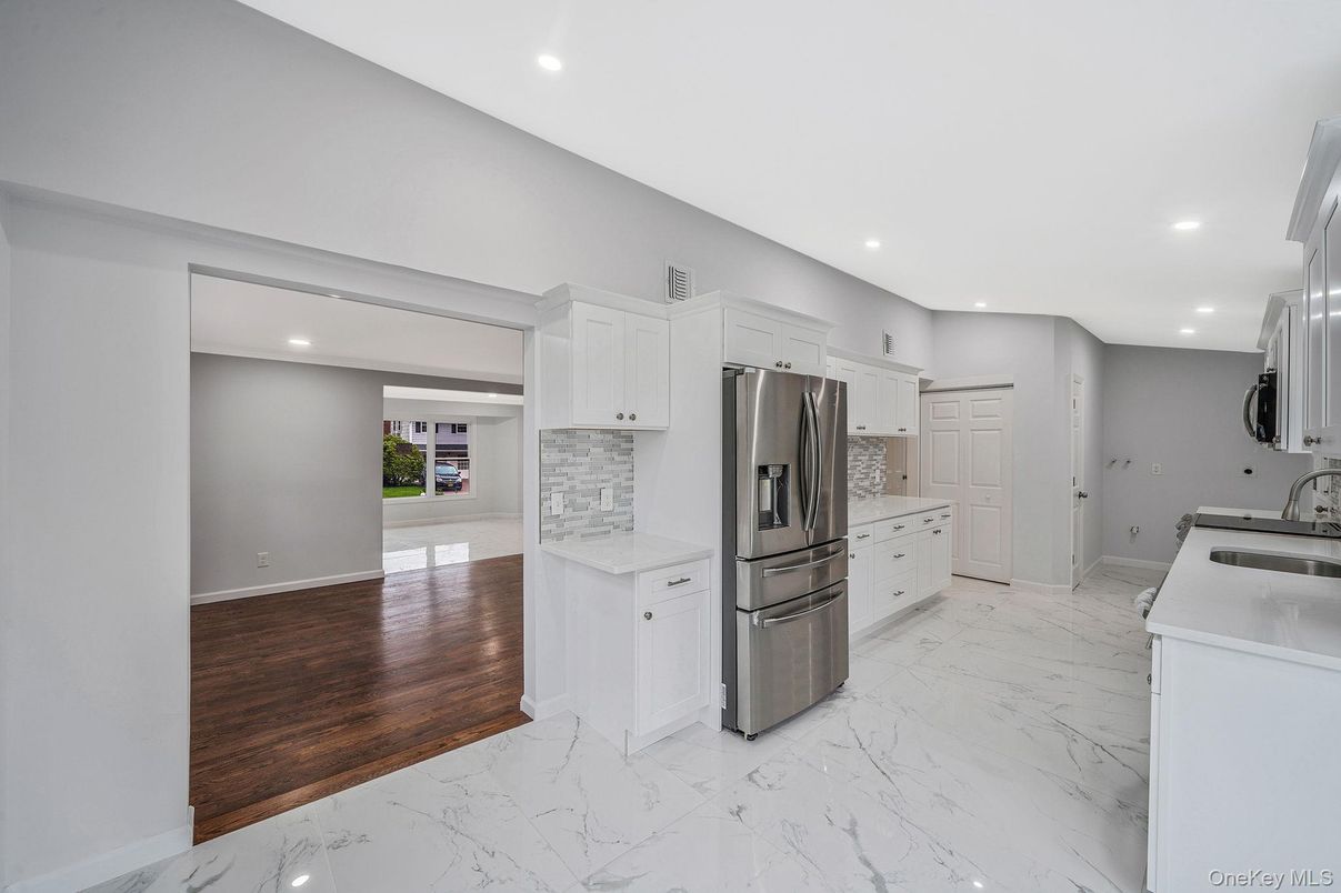 Interior, Kitchen, Marble, Recessed Lighting, Stainless Steel Appliances, Wood Texture Flooring