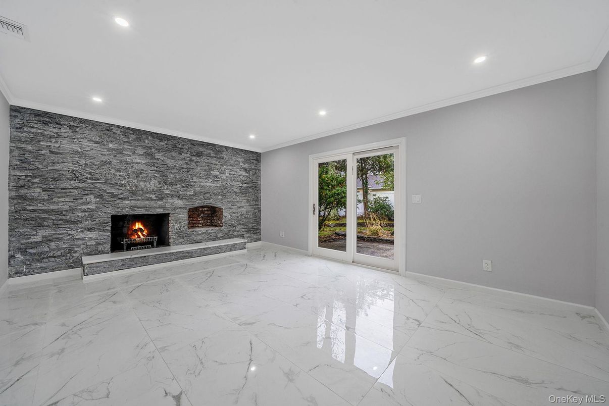 Empty room, Fireplace, Interior, Marble, Recessed Lighting, Stone Walls