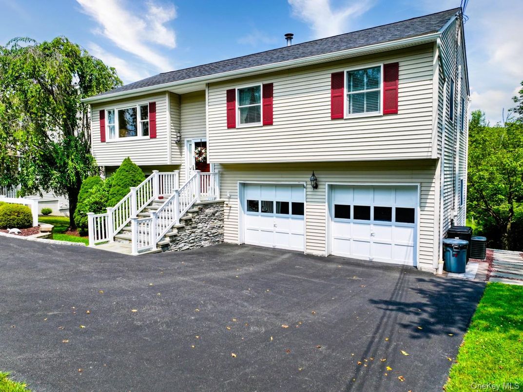 Attached, Exterior, Facade, Raised Ranch