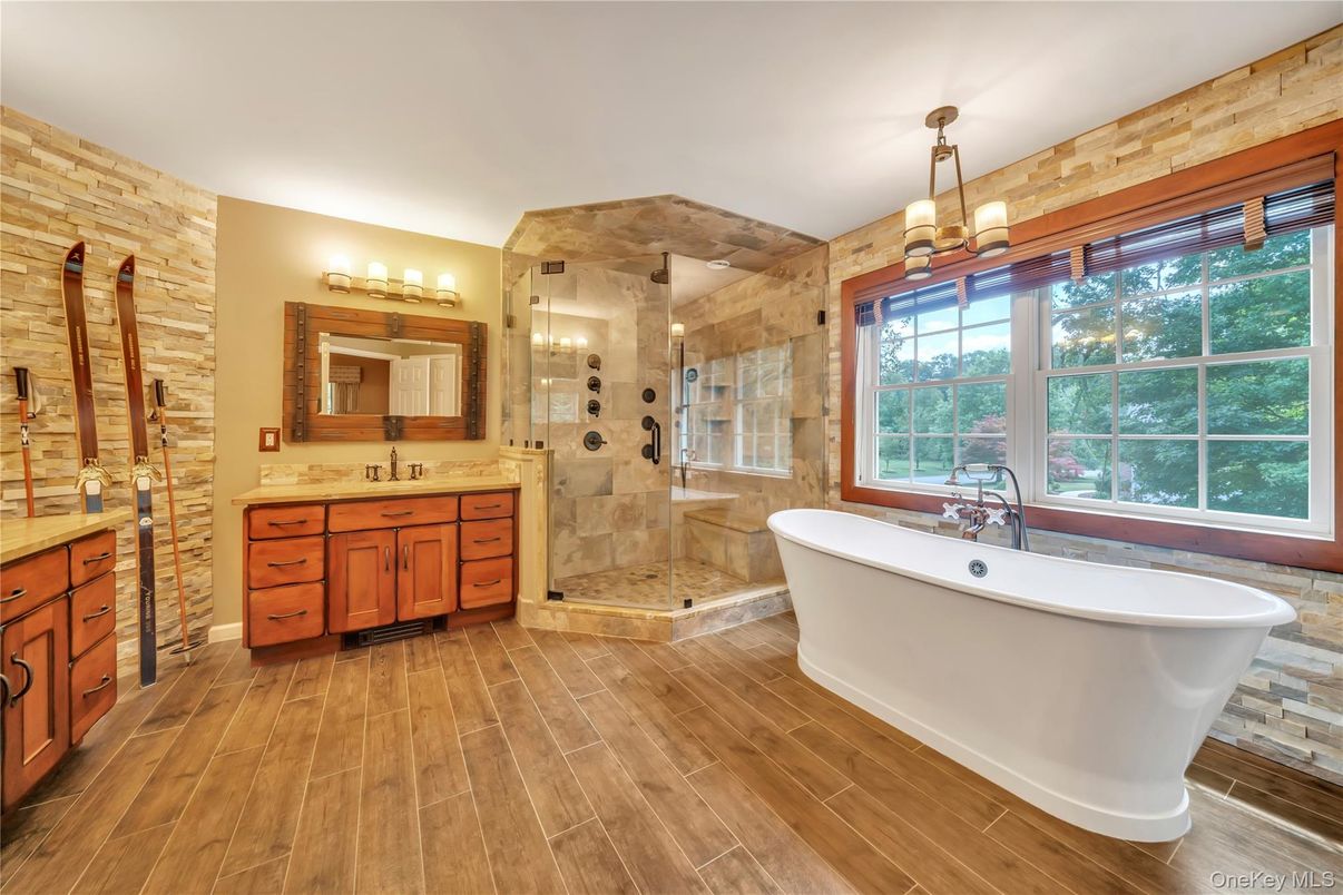 Bathroom, Dual Sink Vanities, Free Standing Baths, Glass Shower, Interior, Pendant Lights, Wood Texture Flooring