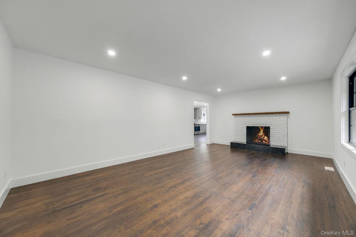 Empty room, Fireplace, Interior, Recessed Lighting, Wood Texture Flooring
