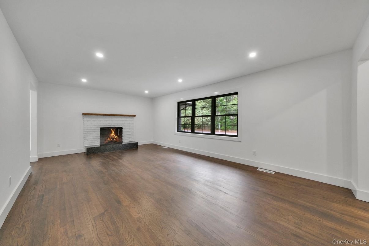 Empty room, Fireplace, Interior, Recessed Lighting, Wood Texture Flooring