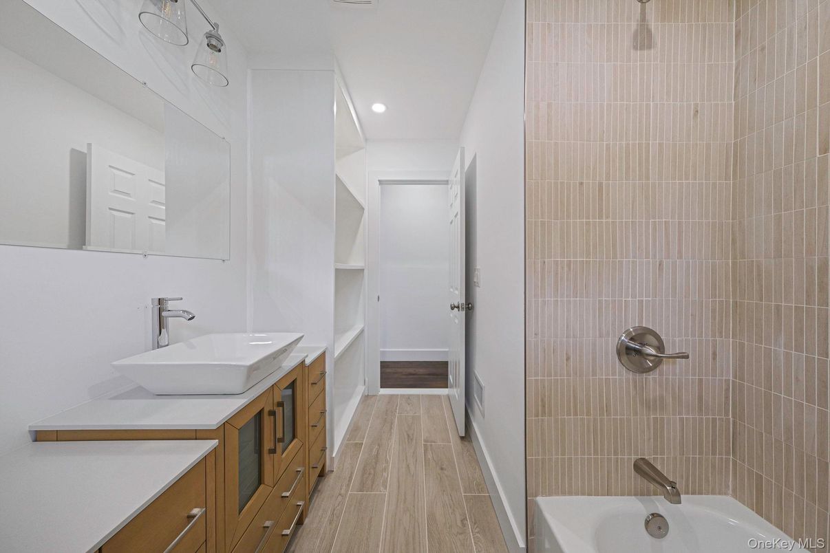 Bathroom, Dual Sink Vanities, Interior, Recessed Lighting, Wood Texture Flooring