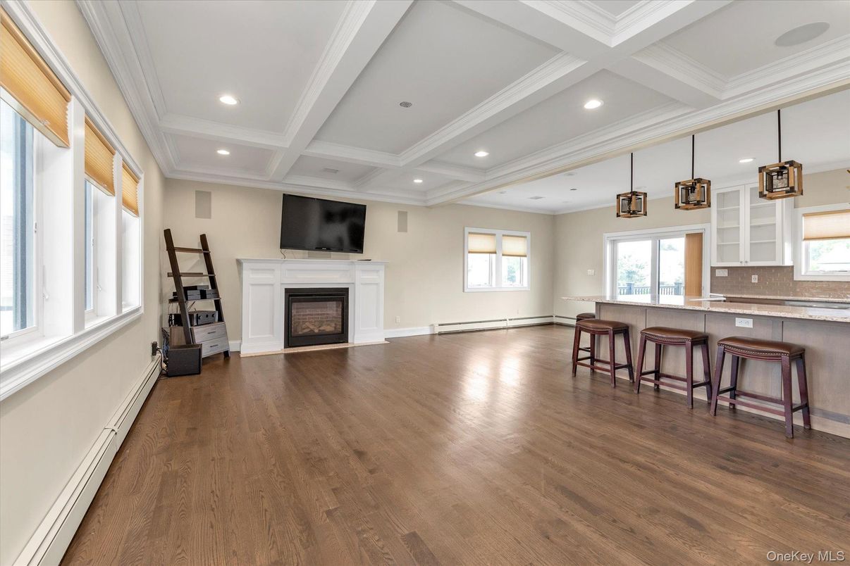 Empty room, Fireplace, Interior, Pendant Lights, Recessed Lighting, Wood Texture Flooring