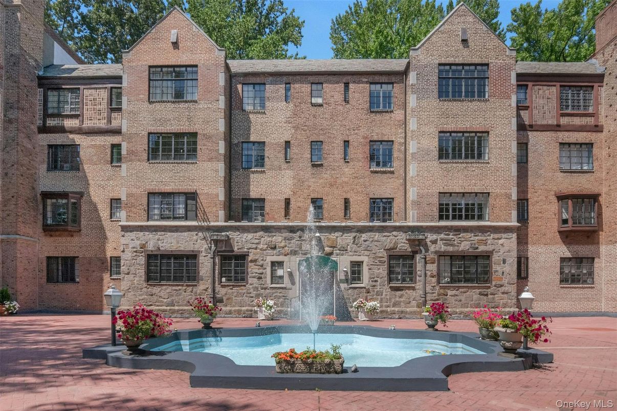 Exterior, Facade, Brick Facade, Pool, Condo Building