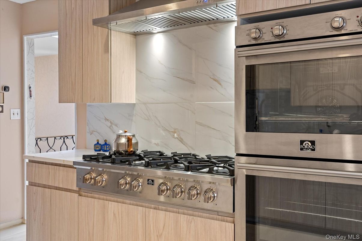 Interior, Kitchen, Marble Walls, Stainless Steel Appliances