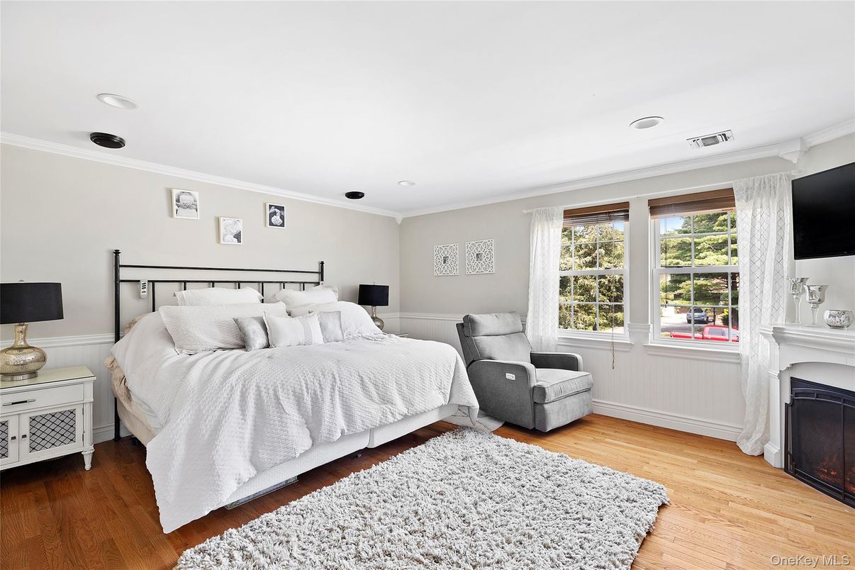 Bedroom, Fireplace, Interior, Recessed Lighting, Wood Texture Flooring