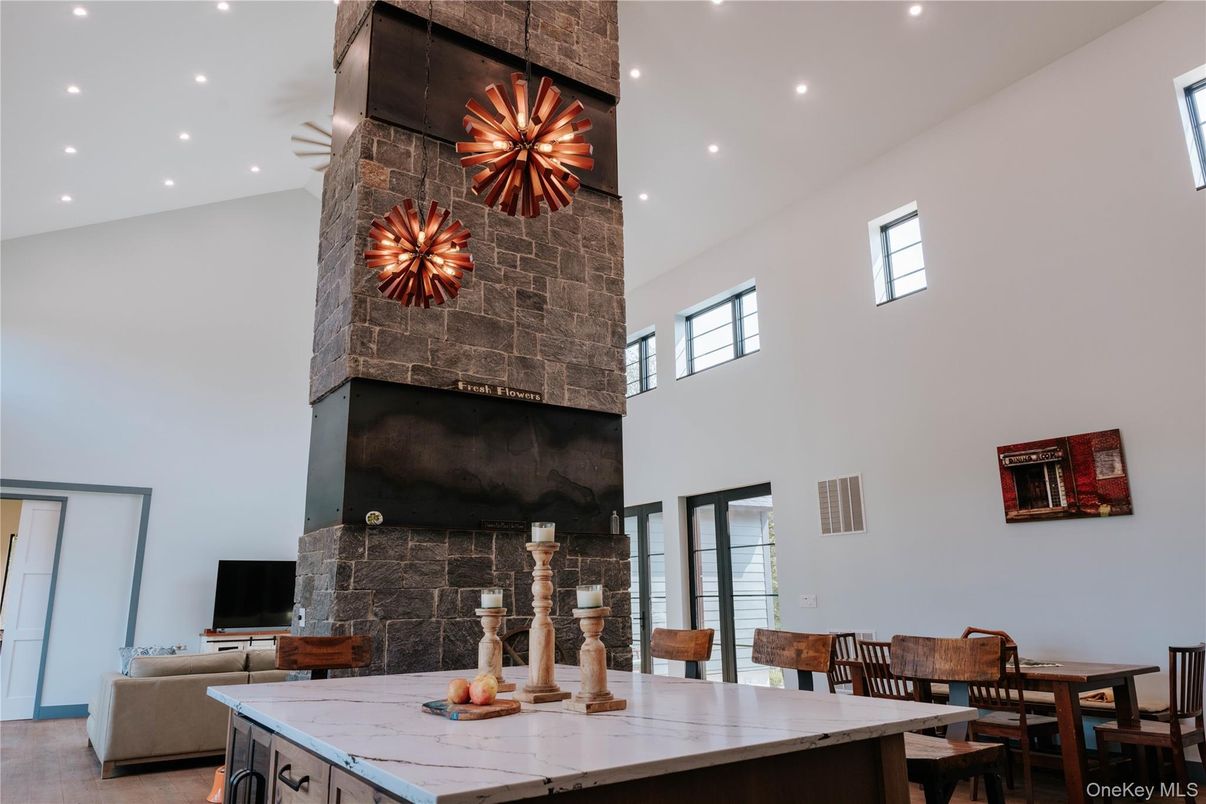 Dining room, Fireplace, Interior, Recessed Lighting, Stone Walls