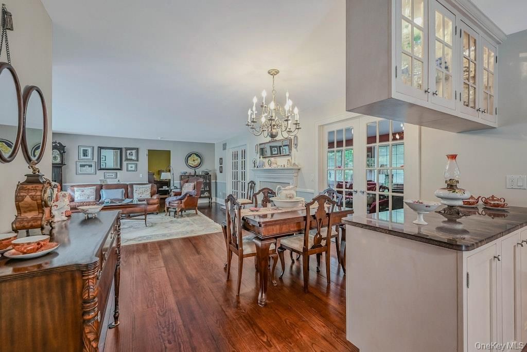 Chandelier, Dining room, Fireplace, Interior, Living room, Wood Texture Flooring