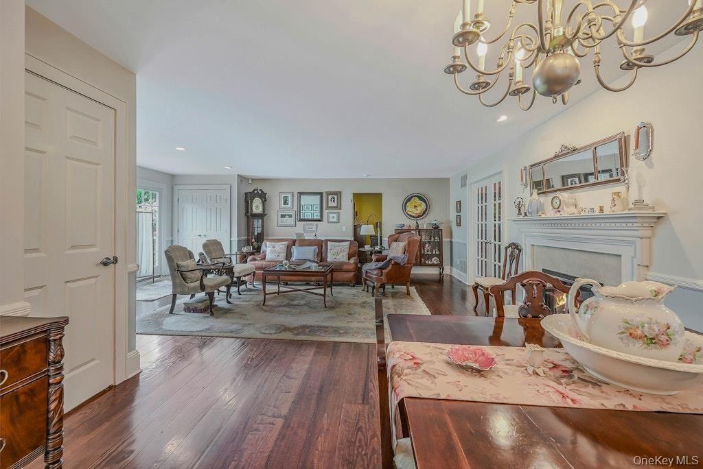 Chandelier, Dining room, Fireplace, Interior, Living room, Recessed Lighting, Wood Texture Flooring