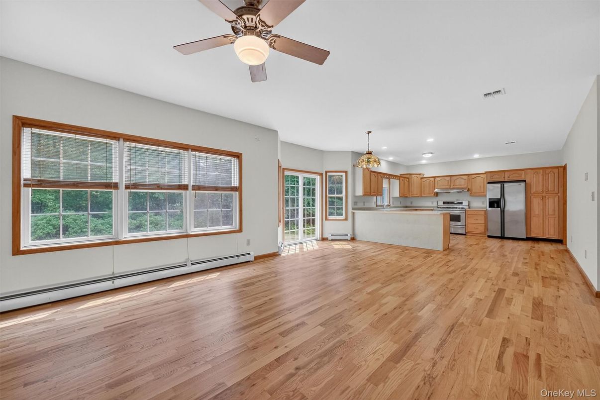 Chandelier, Empty room, Interior, Kitchen, Recessed Lighting, Stainless Steel Appliances, Wood Texture Flooring