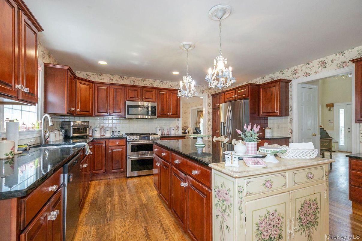 Chandelier, Interior, Kitchen, Pendant Lights, Recessed Lighting, Stainless Steel Appliances, Wood Texture Flooring