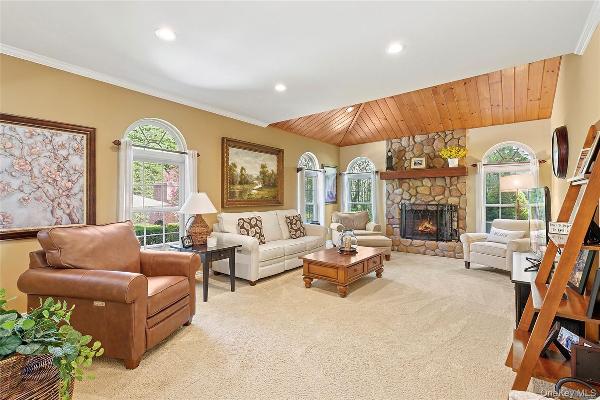 Fireplace, Interior, Living room, Recessed Lighting, Stone Walls, Wooden Ceilings