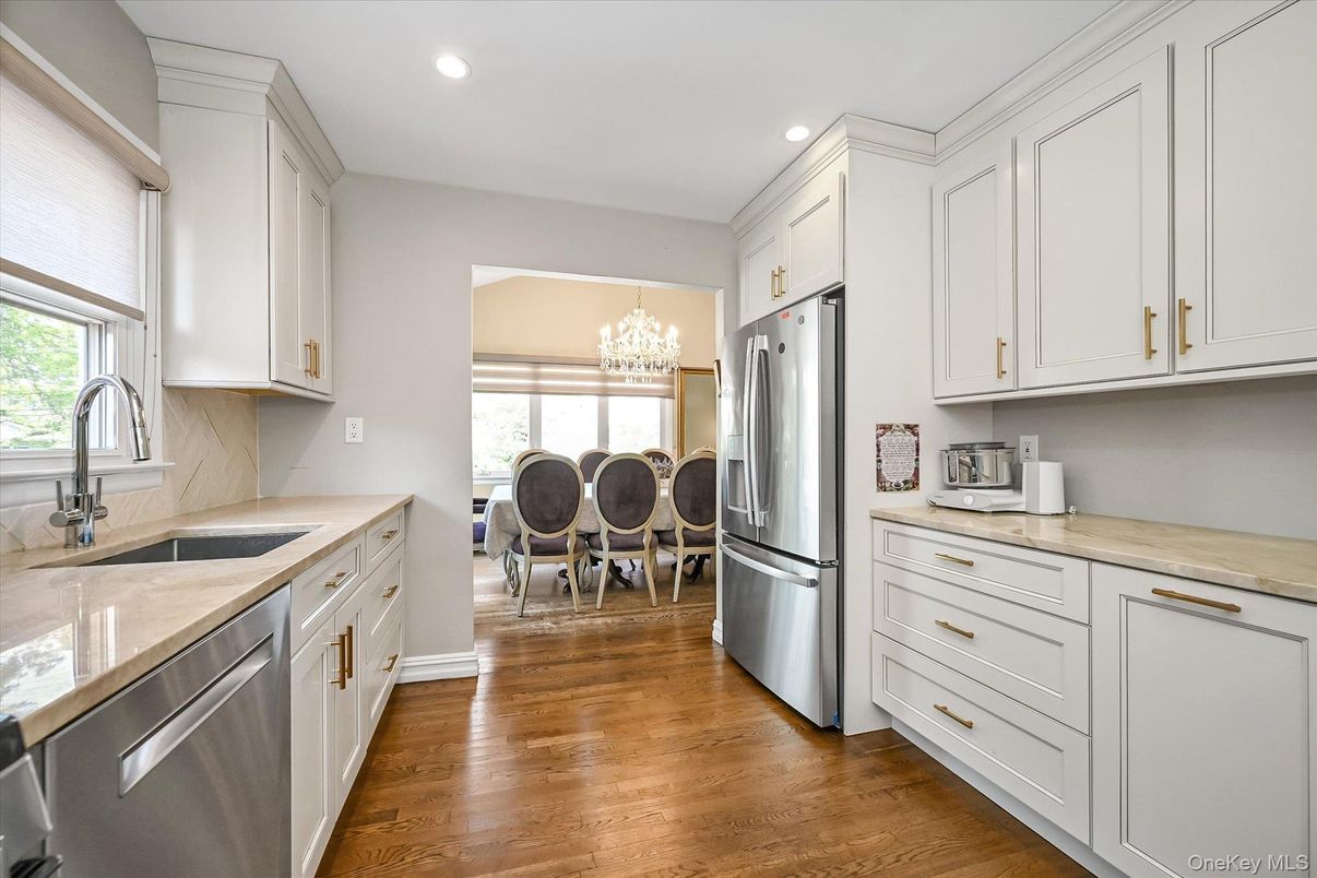 Chandelier, Dining room, Interior, Kitchen, Recessed Lighting, Stainless Steel Appliances, Wood Texture Flooring