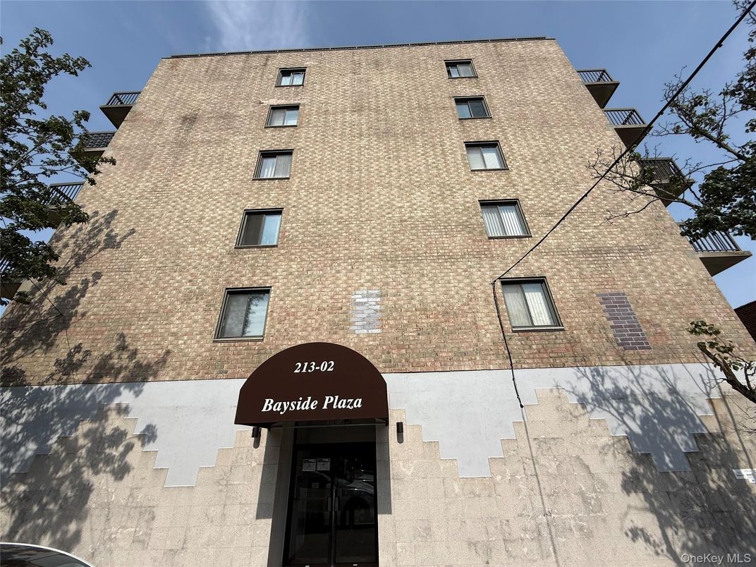 Exterior, Facade, Brick Facade, Condo Building