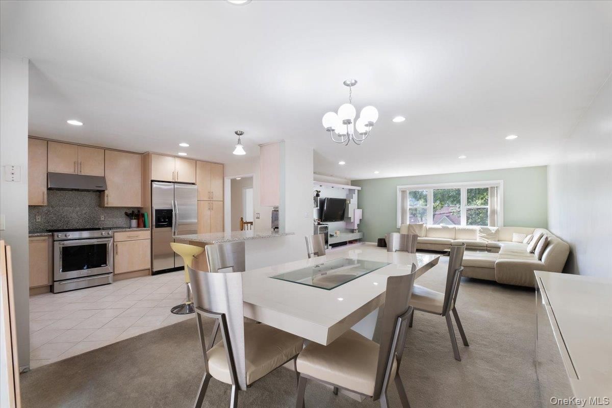 Chandelier, Dining room, Interior, Kitchen, Living room, Recessed Lighting, Stainless Steel Appliances