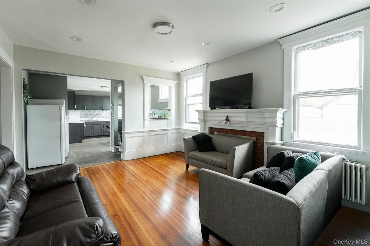 Fireplace, Interior, Kitchen, Living room, Recessed Lighting, Wood Texture Flooring