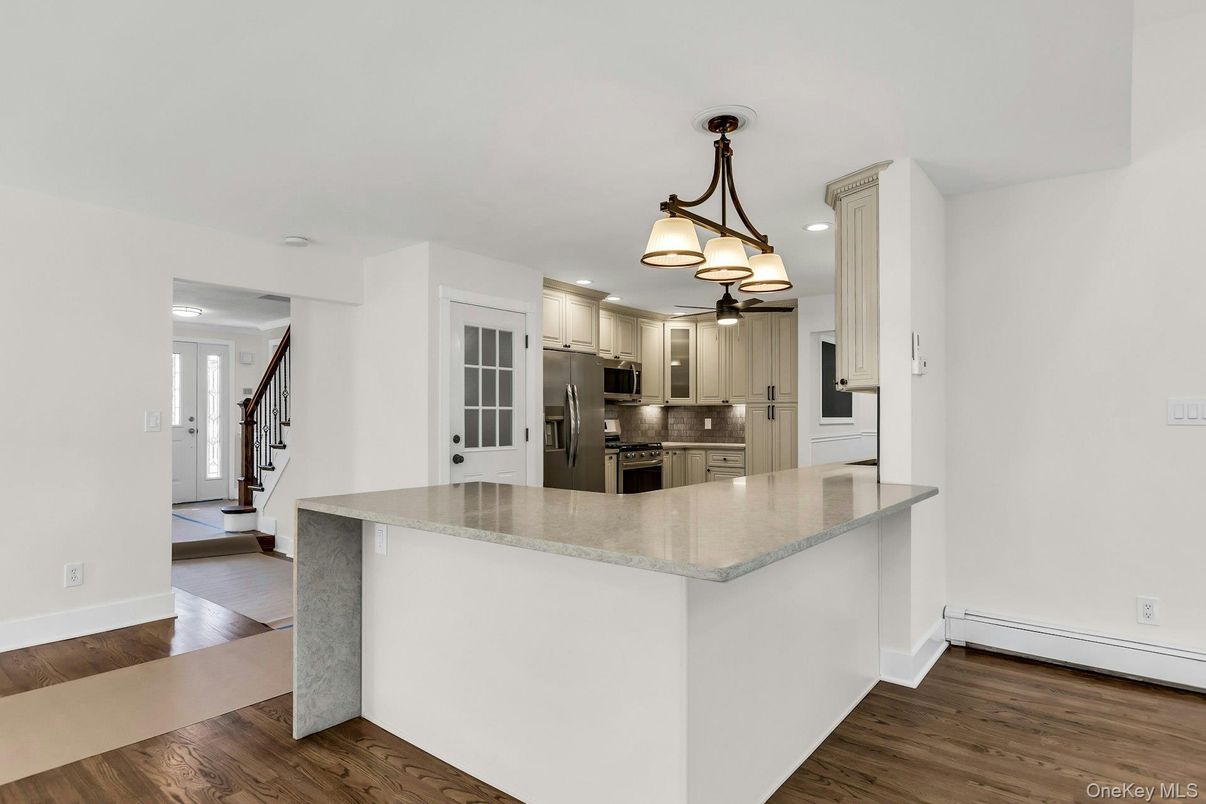 Chandelier, Interior, Kitchen, Recessed Lighting, Stainless Steel Appliances, Wood Texture Flooring