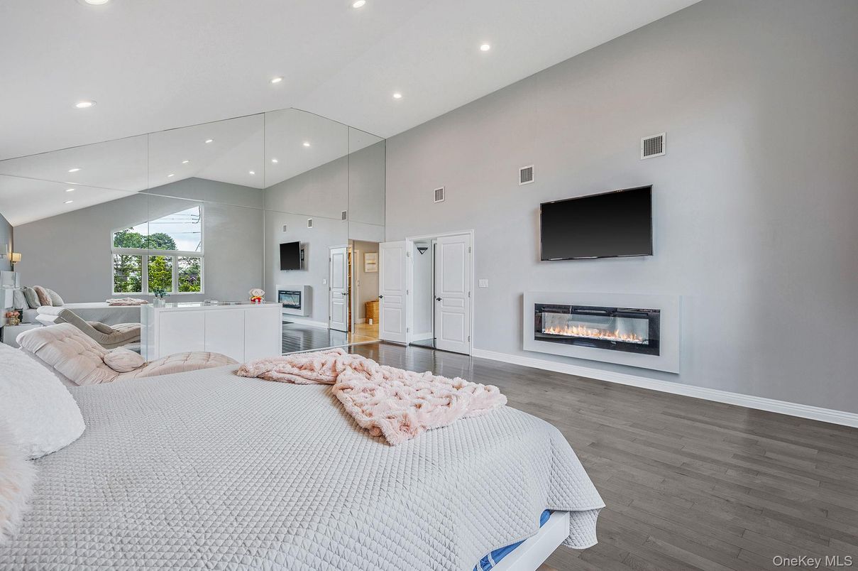 Bedroom, Fireplace, Interior, Recessed Lighting, Wood Texture Flooring