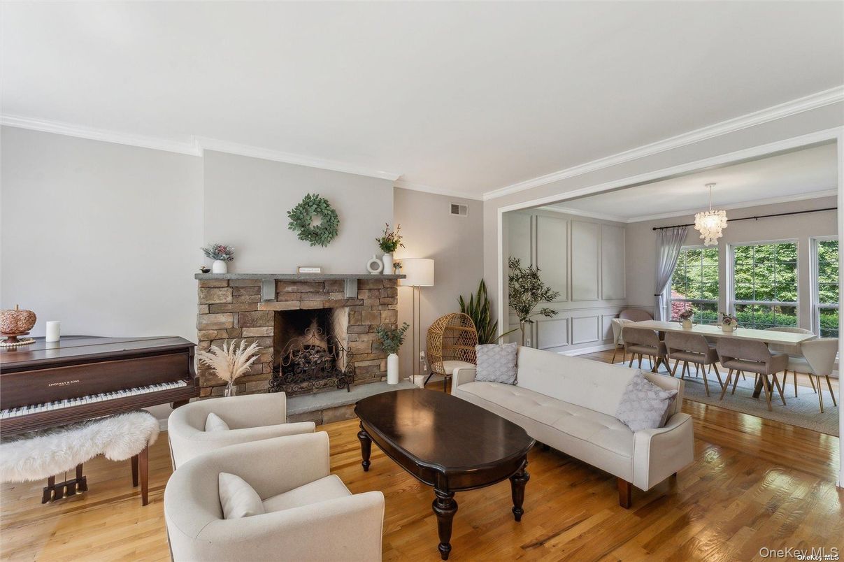 Chandelier, Dining room, Fireplace, Interior, Living room, Piano, Wood Texture Flooring