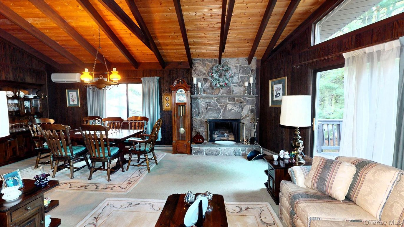 Chandelier, Dining room, Fireplace, Interior, Living room, Stone Walls, Wooden Beams, Wooden Ceilings, Wooden Walls