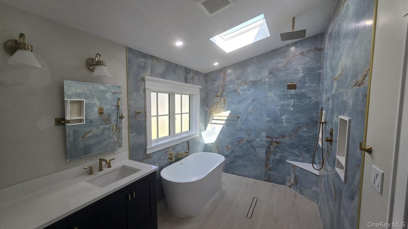 Bathroom, Free Standing Baths, Glass Shower, Interior, Marble Walls, Recessed Lighting