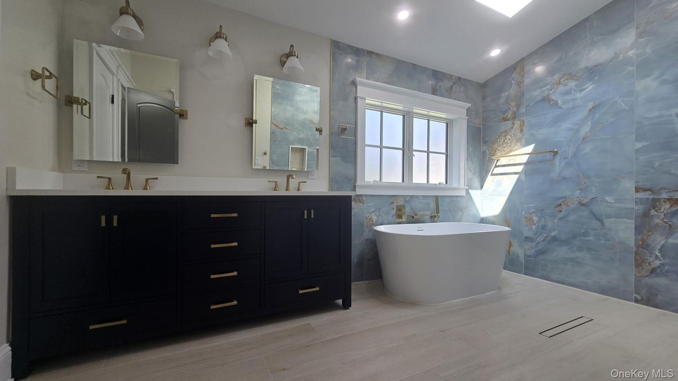 Bathroom, Dual Sink Vanities, Free Standing Baths, Interior, Recessed Lighting, Wood Texture Flooring