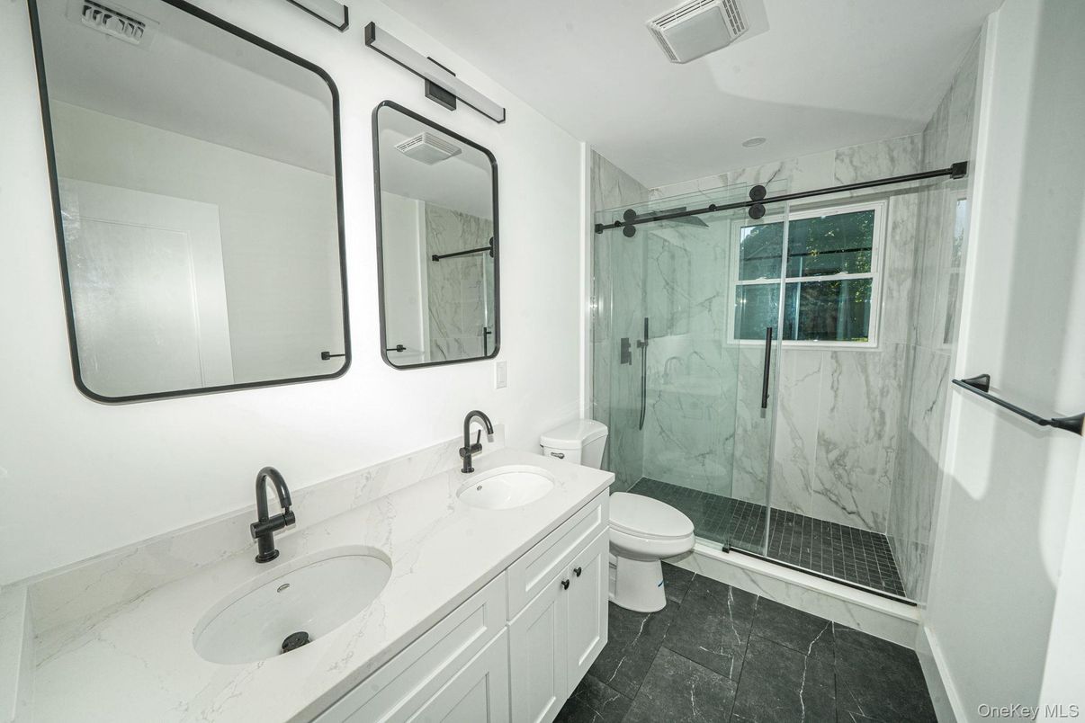 Bathroom, Dual Sink Vanities, Glass Shower, Interior, Marble Walls