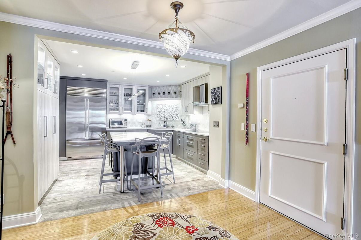 Chandelier, Interior, Kitchen, Recessed Lighting, Stainless Steel Appliances, Wood Texture Flooring