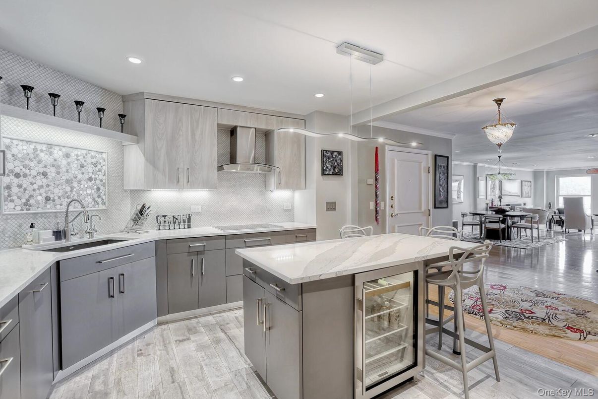 Chandelier, Dining room, Interior, Kitchen, Pendant Lights, Recessed Lighting, Stainless Steel Appliances, Wood Texture Flooring