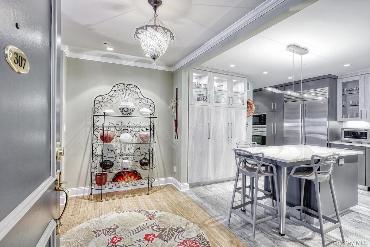 Chandelier, Interior, Kitchen, Pendant Lights, Recessed Lighting, Stainless Steel Appliances, Wood Texture Flooring